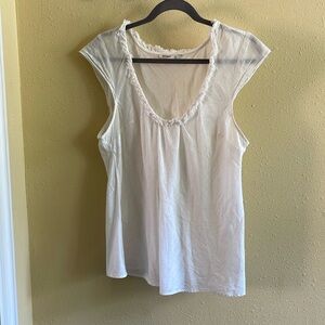 Women’s large 100% cotton capped sleeve shirt.